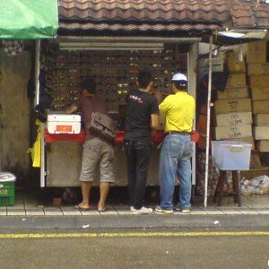 Sun glasses owner quickly open his stall for business..